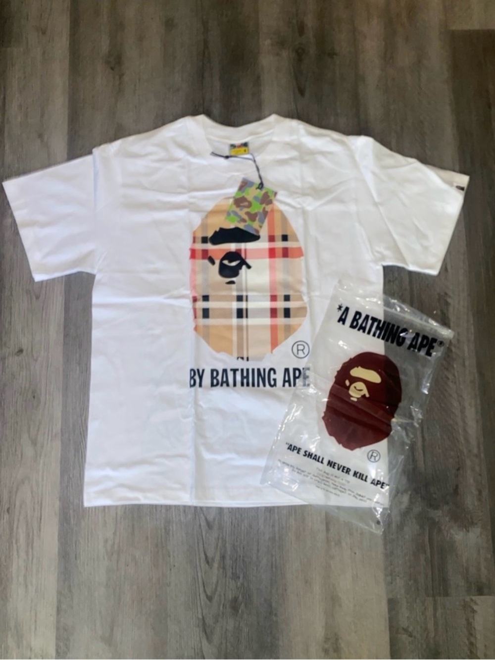 A Bathing Ape White Graphic Tee with Plaid Ape Logo